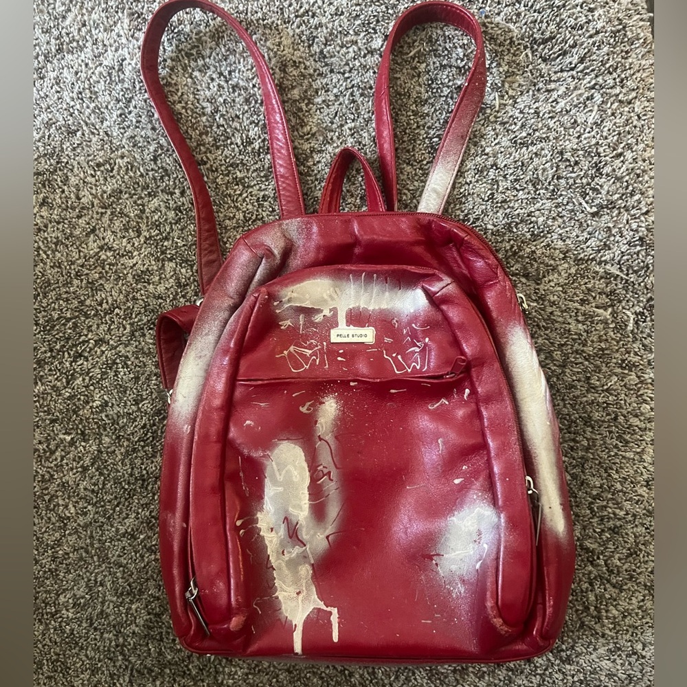 Wilson’s leather Red and White leather Backpack purse